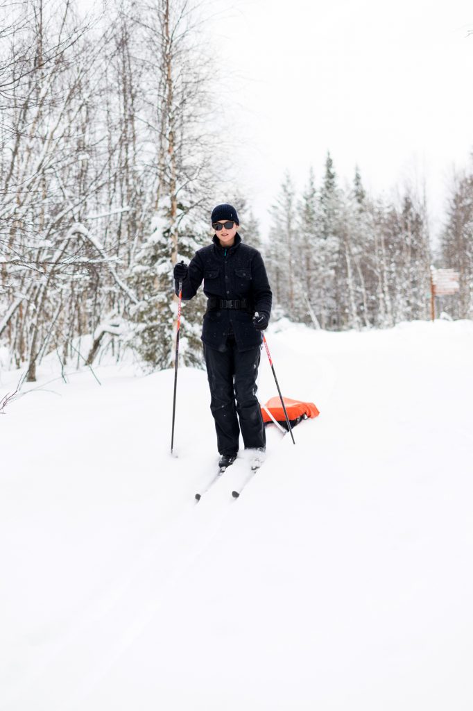 Liz Seabrook wearing a McNair Mountain Shirt on a cross-country skiing expedition in Finland