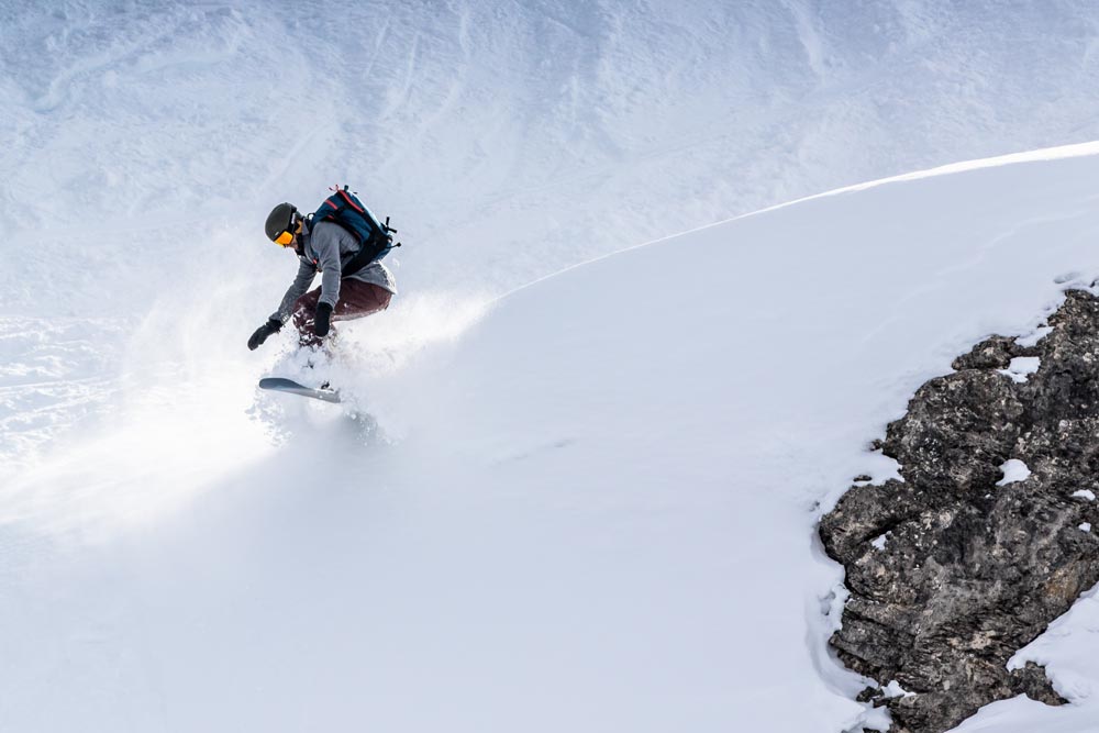 Snowboarding in a McNair merino Mountain Shirt